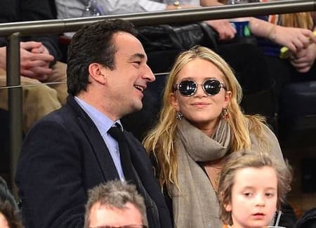 Mary Kate Olsen and Olivier enjoying an event while they were together
